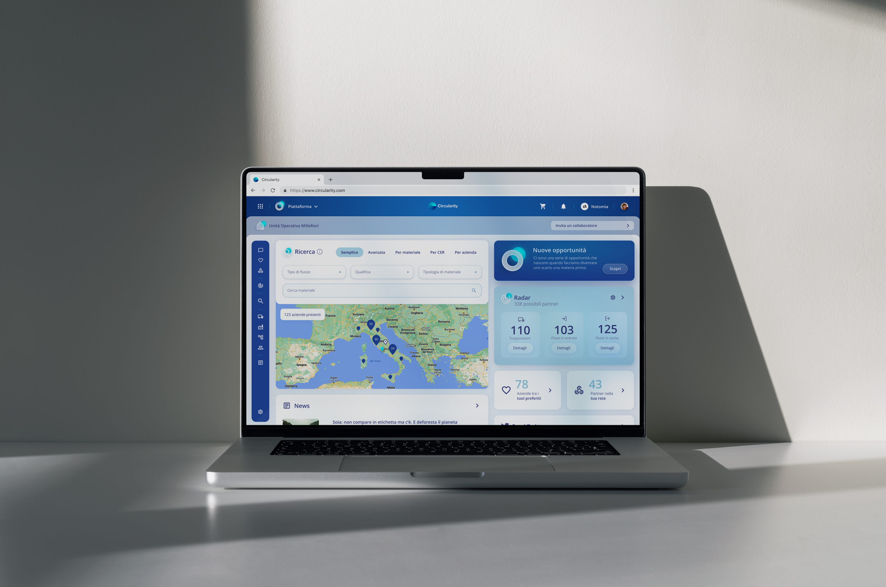 A laptop showing the homepage of Circularity platform. the visible features are: the possibility to search a company in Italy; News and opportunities about sustainability, a short summary of your possible partners to improve your circular economy system.